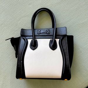 Celine style handbag with black/white styling.